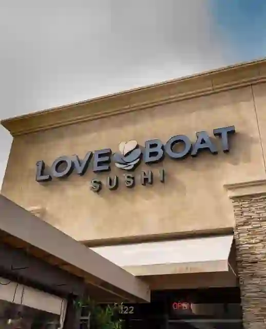 The Love Boat Sushi storefront sign in San Marcos.
